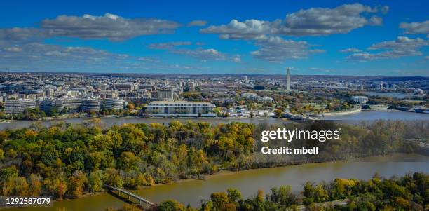 an aerial view of the foggy bottom area of washington dc along the potomac river from rosslyn va - potomac river fotografías e imágenes de stock