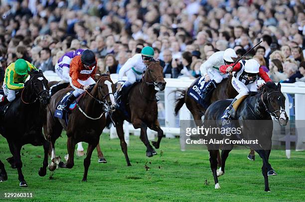Johny Murtagh riding Deacon Blues win the Qipco British Champions Sprint Stakes at Ascot racecourse on October 15, 2011 in Ascot, England.