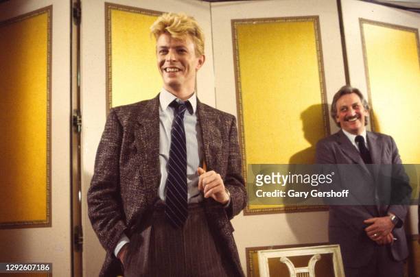View of British Rock musician and actor David Bowie at the Carlyle Hotel, New York, New York, January 27, 1983. He was there to sign a recording...