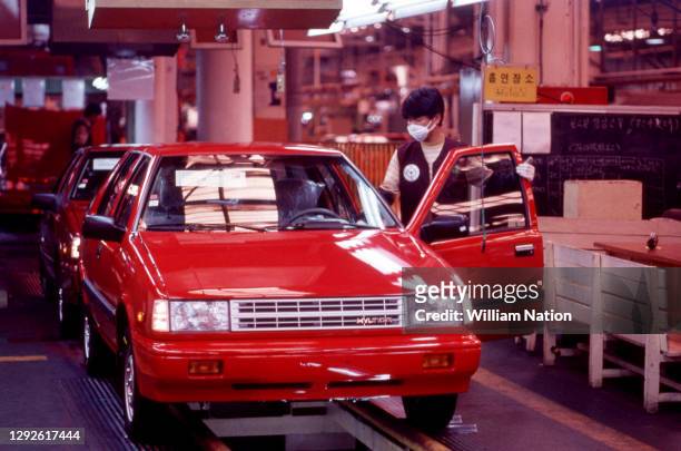 General view of a Hyundai Hatchback Excel being built at a Hyundai Motor Company plant circa April, 1987 in Busan, South Korea.