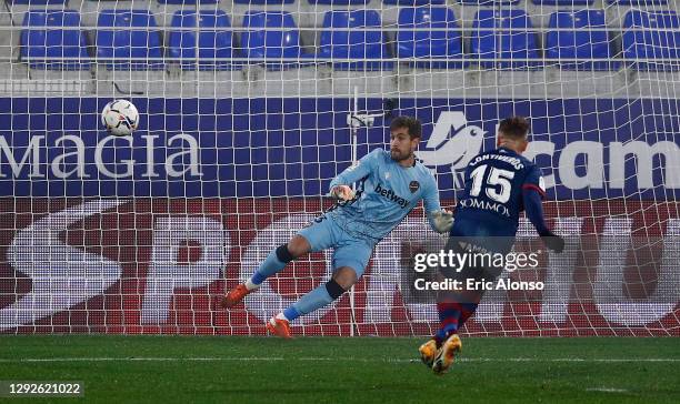 Javi Ontiveros of Huesca scores their team's first goal from a penalty during the La Liga Santander match between SD Huesca and Levante UD at Estadio...