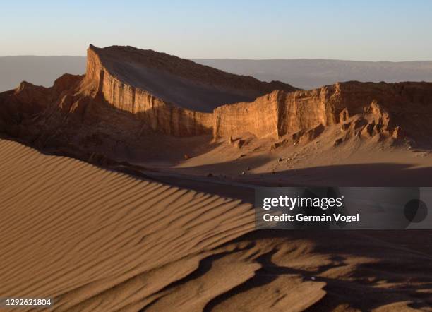 sand dunes and atacama desert landscape, valle de la luna, san pedro, chile - san pedro stock pictures, royalty-free photos & images