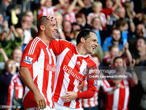 Jonathan Walters of Stoke City is congratulated by Matthew Etherington after scoring the first goal during the Barclays Premier League match between...