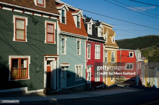 colorful old row houses in downtown st. john's, newfoundland & labrador, canada - newfoundland stock-fotos und bilder