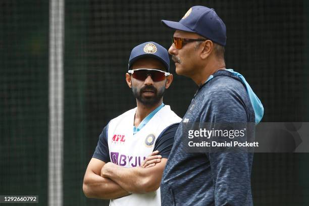 Ajinkya Rahane of India speaks with India head coach Ravi Shastri during an Indian Nets Session at the Melbourne Cricket Ground on December 23, 2020...