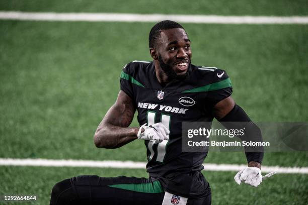 Denzel Mims of the New York Jets stretches ahead of a game against the New England Patriots at MetLife Stadium on November 9, 2020 in East...