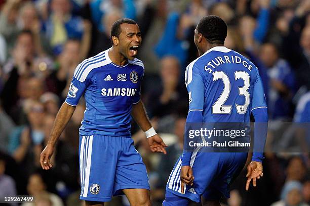 Daniel Sturridge of Chelsea celebrates with his teammate Ashley Cole of Chelsea after Sturridge scored the first goal during the Barclays Premier...