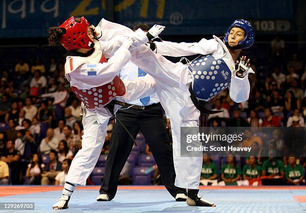 Deireanne Estephany Morales of USA in action with Elizabeth Zamora of Guatemala during the Women's Taekwondo under 49KG category during Day One of...