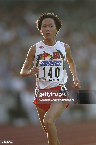Junxia Wang of China in action during the 10 000 metres event at the World Championships in the Gottlieb Daimler Stadium in Stuttgart, Germany. Wang...