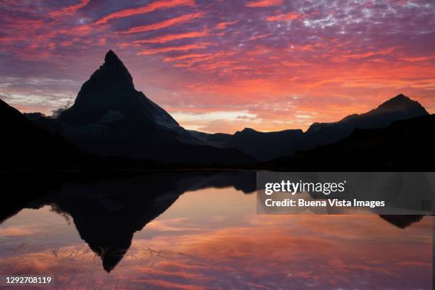sunrise over the matterhorn - impact summit stock pictures, royalty-free photos & images