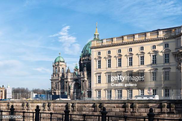 facade of new stadtschloss in historic berlin in front of berlin cathedral at winter day - berliner dom stock pictures, royalty-free photos & images