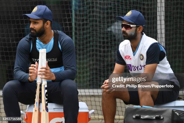 Hanuma Vihari and Ajinkya Rahane of India take a break during a net session at Melbourne Cricket Ground on December 23, 2020 in Melbourne, Australia.