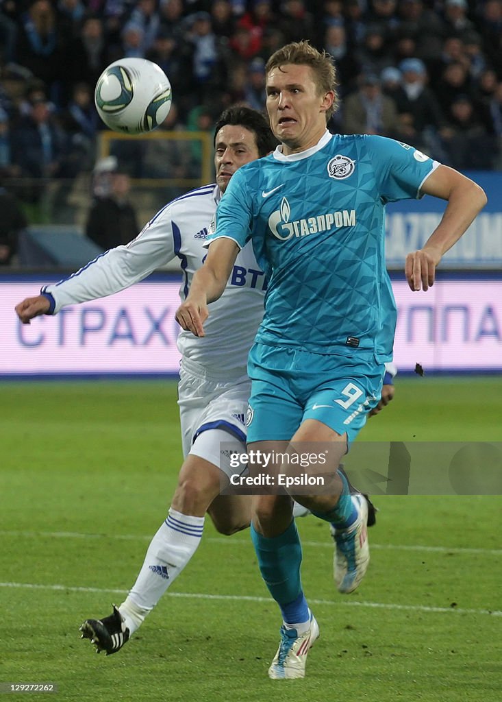 Aleksandr Bukharov of FC Zenit St. Petersburg battles for the ball ...