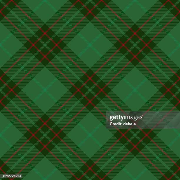 green and red scottish tartan plaid textile pattern - kilt stock illustrations