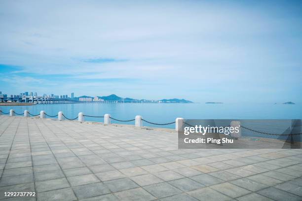 seaside platform - beach road stock pictures, royalty-free photos & images
