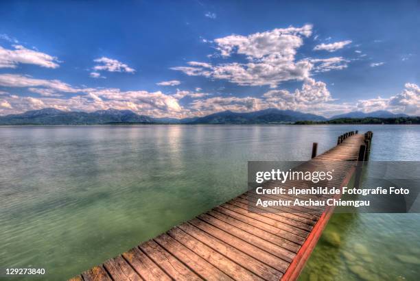 pier at sea - chiemsee stock pictures, royalty-free photos & images