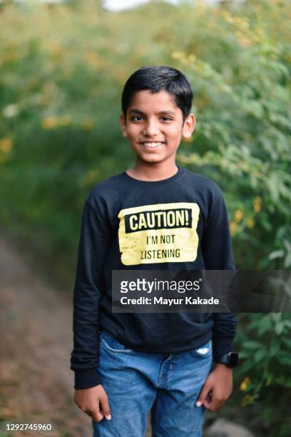 portrait of a boy in a farm - indian boy portrait stock pictures, royalty-free photos & images