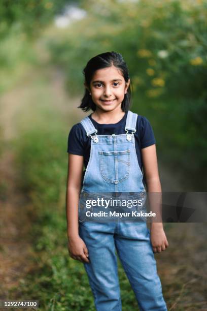portrait of a girl - bib overalls stock pictures, royalty-free photos & images