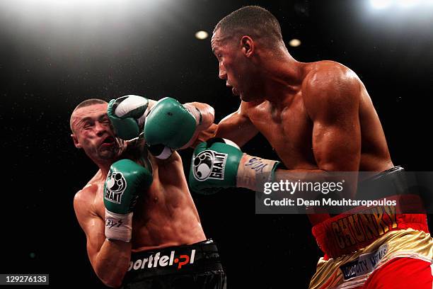 Piotr Wilczewski of Poland is hit by James DeGale of England during the European Super-Middleweight Championship held at Liverpool Echo Arena on...