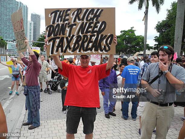 At least 1,000 people marched on October 15, 2011 from the Torch of Friendship in Biscayne Blvd - heart of Miami and close to Brickell Finanacial...