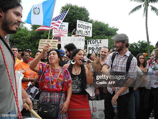 At least 1,000 people marched on October 15, 2011 from the Torch of Friendship in Biscayne Blvd - heart of Miami and close to Brickell Finanacial...