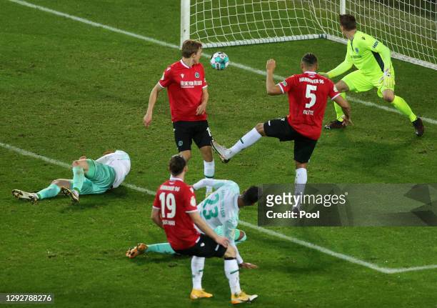 Theodor Gebre Selassie of SV Werder Bremen scores their sides first goal during the DFB Cup second round match between Hannover 96 and SV Werder...