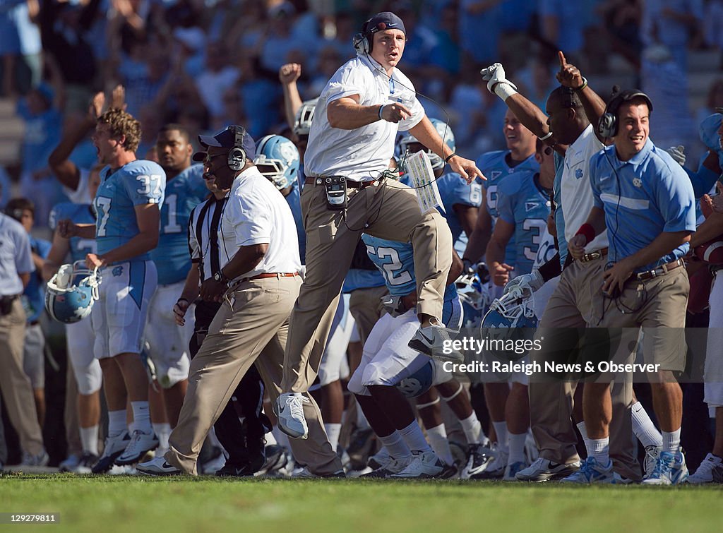 North Carolina tight ends coach Allen Mogridge celebrates after the... News  Photo - Getty Images