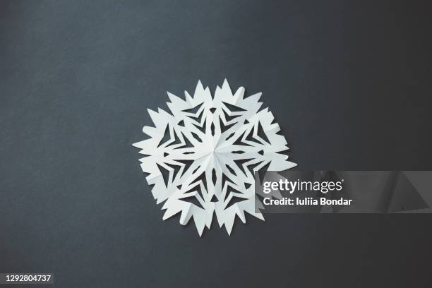 beautiful paper snowflake - paper snowflakes stock-fotos und bilder