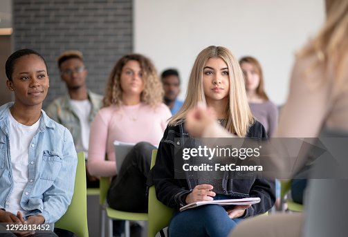 Taking Notes In Lecture Taking Notes In Lecture High-Res Stock Photo - Getty Images