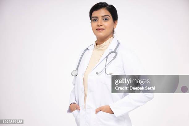 portrait female doctor - stock photo - doctor coat stock pictures, royalty-free photos & images