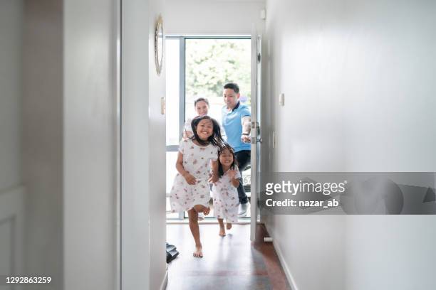 family new home. - home interior stock pictures, royalty-free photos & images