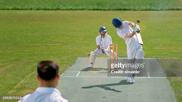 batsman playing cricket - sport of cricket stock pictures, royalty-free photos & images