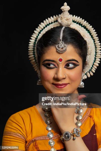 odissi dancer striking a pose - dancer stock pictures, royalty-free photos & images