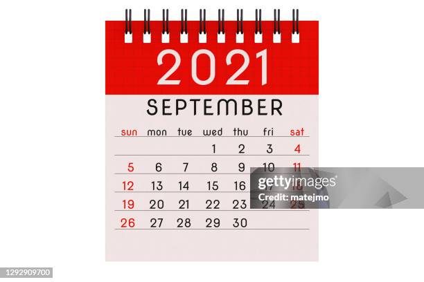 simple stylized 2021 calendar spiral notebook september page in red, isolated on pure white background - spiral binding stock illustrations