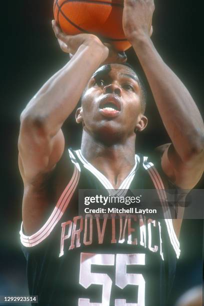 Eric Williams of the Providence Friars takes a foul shot during a college basketball game against the Georgetown Hoyas on January 15, 1994 at USAir...