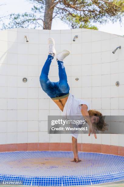 Pool Hand Stand Pool Handstand Photos and Premium High Res Pictures - Getty Images