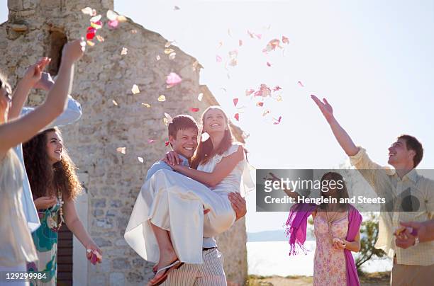 friends celebrating newlywed couple - europe bride stock pictures, royalty-free photos & images