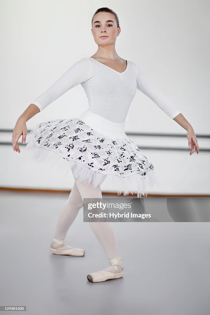 Ballet dancer posing in studio