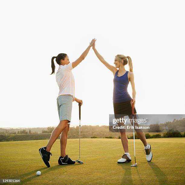 High Five Course Golf High Five Photos and Premium High Res Pictures - Getty Images