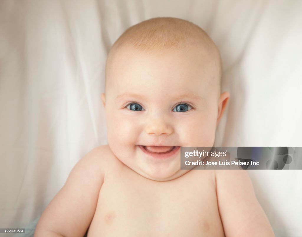Smiling Caucasian baby girl