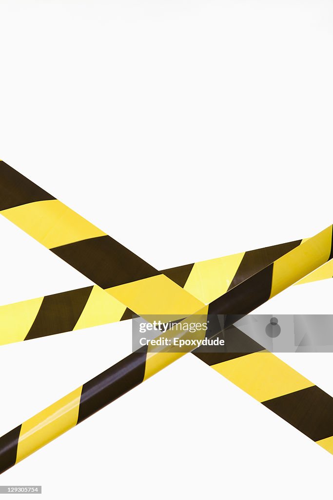 Crisscrossed yellow and black striped cordon tape