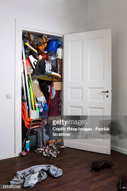 a closet stuffed with various storage items - organised group stock-fotos und bilder