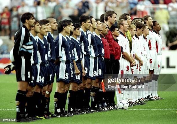 Argentina and England line up for the national anthems before the World Cup second round match at the Stade Geoffroy Guichard in St Etienne, France....