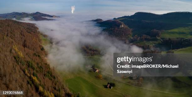 aerial view ifleter berg with view to ifenthal, the sea of fog in the midlands and the steam cloud from the nuclear power plant goesgen, solothurn, switzerland - solothurn stockfoto's en -beelden