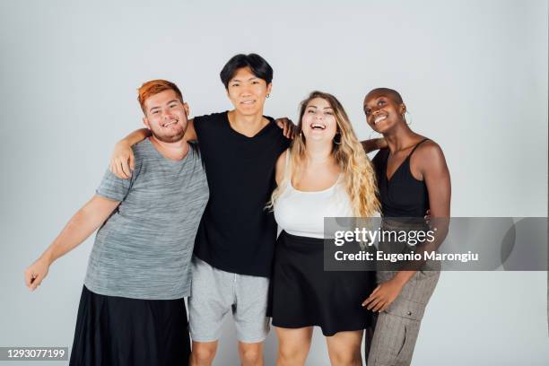 studio portrait, four young adult friends - four people white background stock pictures, royalty-free photos & images