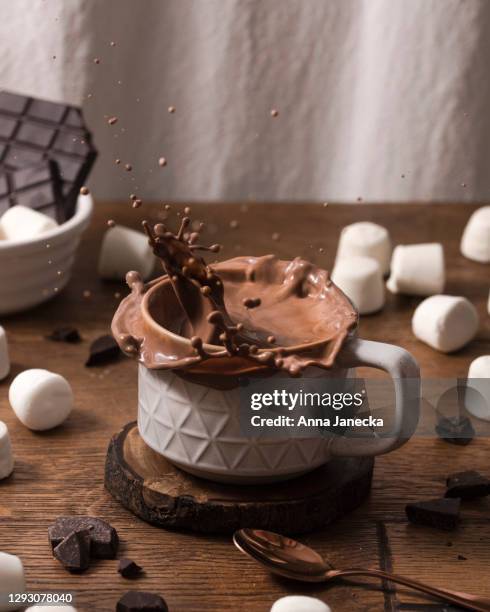 hot chocolate splash - hot chocolate stock pictures, royalty-free photos & images