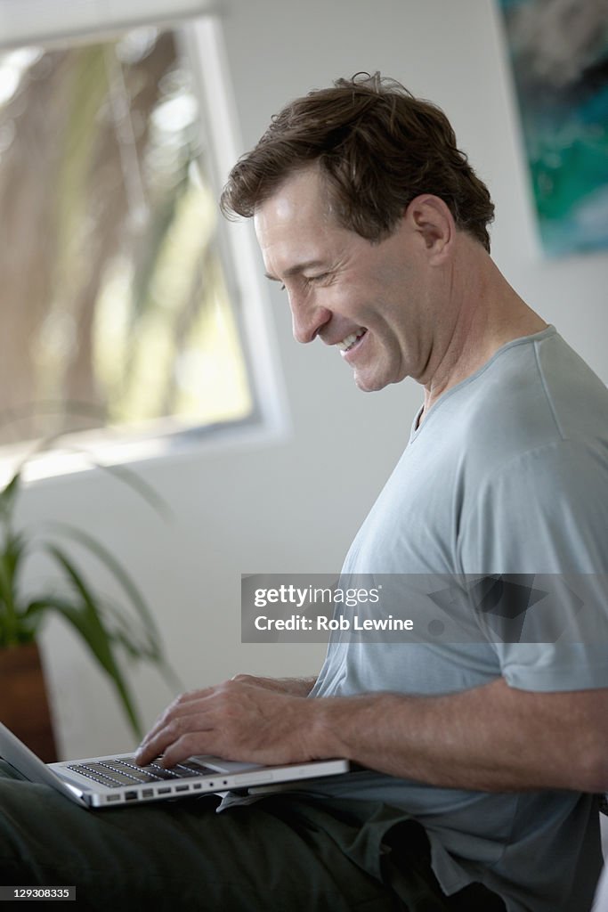 Mature man with laptop