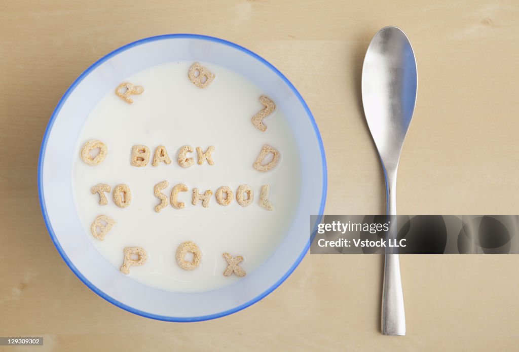 Studio shot of bowl of cereal spelling out BACK TO SCHOOL