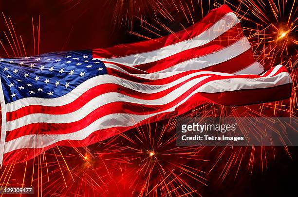 usa, new york, new york city, fourth of july fireworks with american flag - american flag clip art stock-fotos und bilder