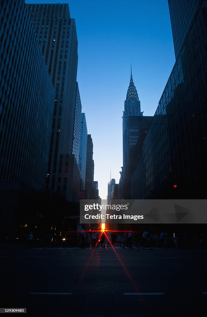 USA, New York, New York City, Chrysler Building and street at sunset